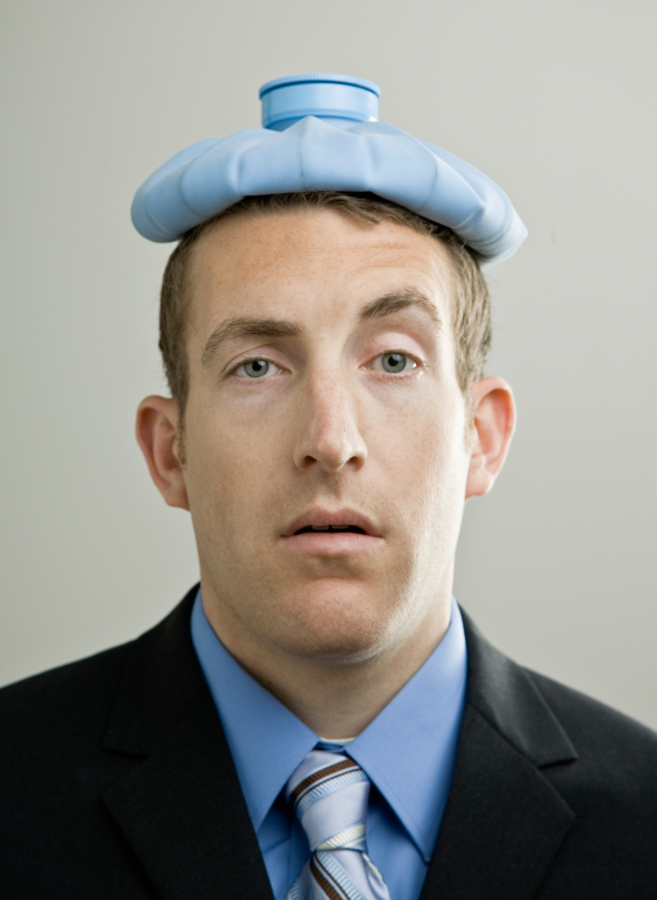 Businessman with Ice Pack